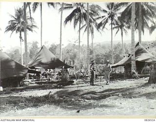 MILILAT, NEW GUINEA. 1944-10. THE ORDERLY ROOM, OFFICERS' MESS AND SERGEANTS' MESS HQ 4 ARMOURED BRIGADE