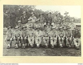 LAE, NEW GUINEA. 1944-08-03. PERSONNEL OF THE 39TH LINES OF COMMUNICATION SALVAGE DEPOT. IDENTIFIED PERSONNEL ARE:- TX15420 CORPORAL L.M. NICHOLSON (1); VX65180 SERGEANT A.W. KING (2); VXV127621 ..