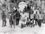 Native pastors in front of the monument of the first evangelists who came in Maré, Tataio and Taniela