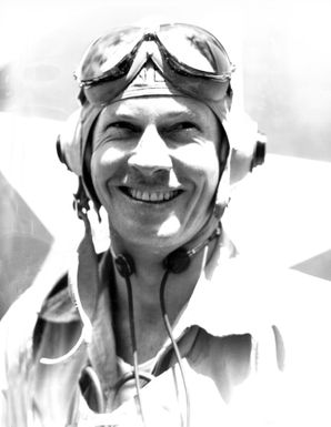 World War II (WWII) era photograph of US Marine Corps (USMC) Major (MAJ), Joseph H. Reinberg, taken at Guadalcanal, July 4, 1943. MAJ Reinberg is an Ace Pilot credited with 7 kills. (Substandard image)