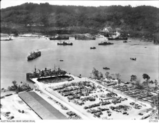 LANGEMAK BAY, NEW GUINEA. 1944-04-03. AN AERIAL PHOTOGRAPH INDICATING THE PORT DEVELOPMENT AND THE INCREASED MOVEMENT OF SUPPLIES THROUGH THE AREA