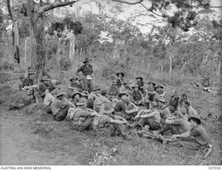 PAPUA, NEW GUINEA. 1942-10. TACTICAL LECTURE FOR MEN OF THE 39TH AUSTRALIAN INFANTRY BATTALION IN THE JUNGLE DURING A RESPITE FROM THE FORWARD AREA