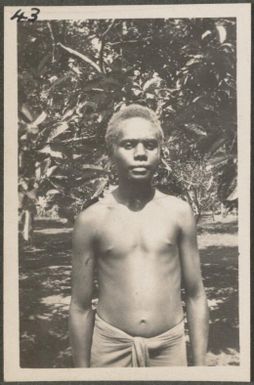 Papuan boy in a loin cloth, New Britain Island, Papua New Guinea, approximately 1916