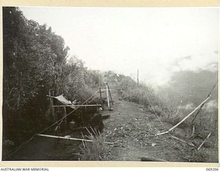 NEW GUINEA. APRIL, 1944. AN AUSTRALIAN SIGNALS TENT ON SHAGGY RIDGE PHOTOGRAPHED IMMEDIATELY AFTER THE BATTLE