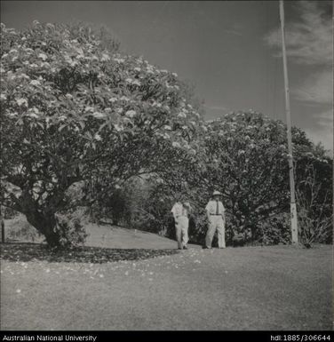 Officers walking through garden