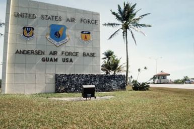 A close-up view of the base sign displaying the 13th Air Force and 36th Air Base Emblems