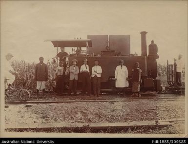 Fowler Locomotive, people and quadracyclist on rail line, Lautoka Mill