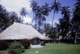 French Polynesia, thatched-roofed house on Moorea Island