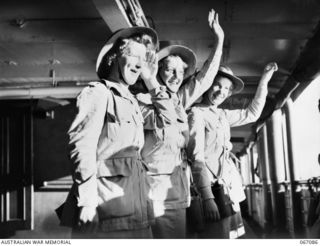 TOWNSVILLE, NORTH QUEENSLAND, AUSTRALIA. 1944-06-27. HAPPY MEMBERS OF THE AUSTRALIAN ARMY MEDICAL WOMEN'S SERVICE OF THE 2/1ST GENERAL HOSPITAL WAITING TO DISEMBARK FROM THE H.M.T. "ORMISTON" ON ..