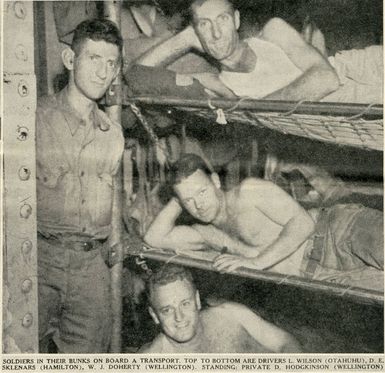 Soldiers in their bunks on board a transport