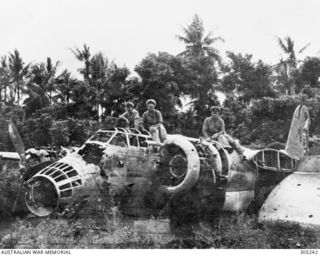ALEXISHAFEN, PAPUA NEW GUINEA. 1944-09. THE WRECKAGE OF A JAPANESE NAKAJIMA KI-49 DONRYU (HELEN) BOMBER AT THE AIRSTRIP. (NAVAL HISTORICAL COLLECTION)