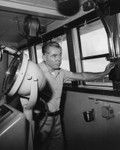 A view from the Bridge - Captain Joe Clarke, one of the D/V Glomar challenger's two skippers, looks forward from the bridge as the drilling vessel leaves the harbor at Guam to begin Leg 61 of the Deep Sea Drilling Project