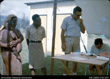 Woman and child waiting to vote