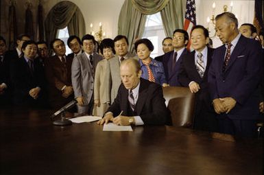 President Gerald R. Ford Signing a Proclamation Confirming the Termination of Executive Order 9066 in the Cabinet Room