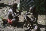 Two men talking at Ngarinaasuru