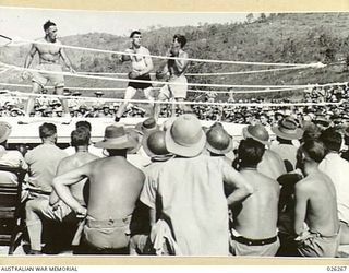 PAPUA. 1942-08-18. BOXING TOURNAMENT HELD BETWEEN ALL SERVICES AT PORT MORESBY WHEN AUSTRALIANS AND AMERICANS COMPETED