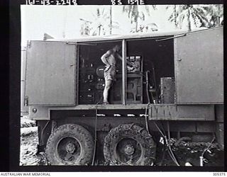 RENDOVA. BRITISH SOLOMON ISLANDS PROTECTORATE. C.1944. THE POWER PLANT FOR A NEW ZEALAND MANNED AIR SEARCH RADAR. (NAVAL HISTORICAL COLLECTION)