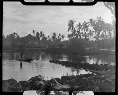 Unidentified man on a boat in lagoon at Faleolo, Apia, Upolu, Samoa