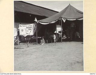 WEWAK AIRSTRIP, NEW GUINEA, 1945-09-17. THE AUSTRALIAN COMFORTS FUND COFFEE BUFFET WITH SERVICE FOR AIR MOVEMENT PERSONNEL