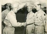 Frank Gutoski receiving "Soldiers Medal" from Major General A.V. Arnold, Oahu, Hawaii, 1944