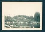 View of European style house from river [?], New Guinea, c1929 to 1932