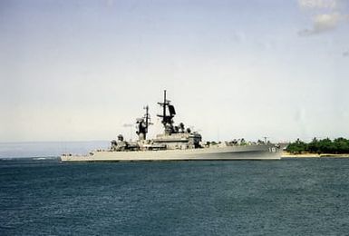 The guided missile cruiser USS WORDEN (CG-18) enters the channel as it arrives for a visit to Naval Station, Pearl Harbor, Hawaii.