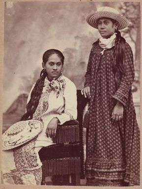 Portrait of two young girls with hats. From the album: Tahiti, Samoa and New Zealand scenes