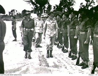 THE SOLOMON ISLANDS, 1945. AN INSPECTION ON BOUGAINVILLE ISLAND OF A PARADE OF AUSTRALIAN SOLDIERS BEING CARRIED OUT BY THE GOVERNOR GENERAL OF AUSTRALIA, HRH THE DUKE OF GLOUCESTER. THE GOVERNOR ..