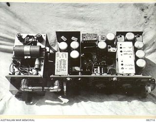 MADANG, NEW GUINEA. 1944-10-12. THE NO. 19 SET M3 FROM A CHURCHILL VII TANK WITH ITS FRONT PANEL VIEWED FROM ABOVE. THE TANK IS ENGAGED IN TESTS AT HQ 4 ARMOURED BRIGADE