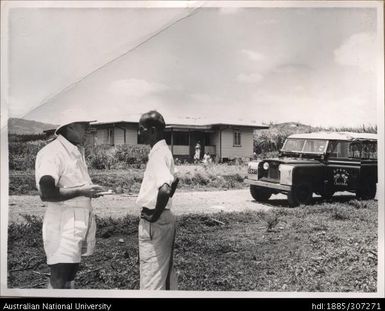 Field Officer speaking to Farmer