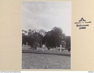 SOPUTA, NEW GUINEA, 1945-06-26. THE AUSTRALIAN WAR CEMETERY MAINTAINED BY THE AUSTRALIAN WAR GRAVES SERVICE. A JEWISH GRAVE IS IN THE FOREGROUND