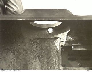 FORTIFICATION POINT, NEW GUINEA. 1944-04-06. THE EFFECT OF A HOLLOW CHARGE PROJECTILE FIRED FROM A JAPANESE 75MM REGIMENTAL GUN TYPE MEIJI 41 AT THE FRONTAL ARMOUR OF A DISABLED MATILDA TANK DURING ..