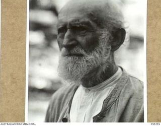 TAMIGUDU, NEW GUINEA, 1943-10-21. PORTRAIT OF REVEREND JOHANN DEKKER, AGED 79 YEARS, LUTHERAN MISSIONARY WHO HAS BEEN IN NEW GUINEA SINCE 1895. HE CARRIED ON WITH HIS WORK DURING THE JAPANESE ..