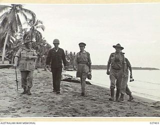 WANIGELA, NEW GUINEA. 1942-10. VISIT OF GENERAL SIR THOMAS BLAMEY GBE KCB CMG DSO ED, COMMANDING ALLIED LAND FORCES, SOUTH WEST PACIFIC AREA, TO WANIGELA. LEFT TO RIGHT: GENERAL BLAMEY, ..