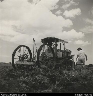 Famers on tractor with Field Officer