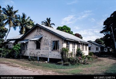 Fiji - white wooden house with some paint damage