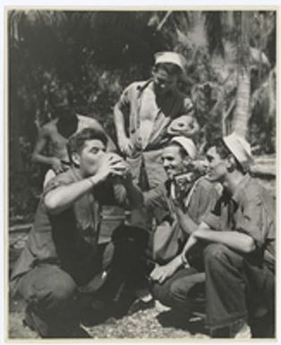 [Servicemen drinking beverages on Mogmog Island]