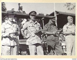 TOROKINA, BOUGAINVILLE. 1945-08-16. A SCENE DURING THE SINGING OF A HYMN AT THEVICTORY THANKSGIVING SERVICE HELD AT GLOUCESTER OVAL FOR TROOPS OF THE AUSTRALIAN MILITARY FORCES. IDENTIFIED ..