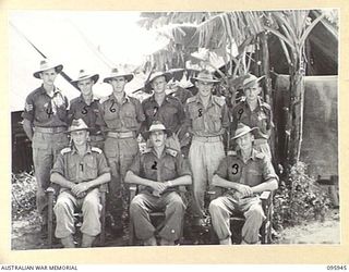 WEWAK POINT, NEW GUINEA. 1945-08-30. OFFICERS AND SENIOR NON COMMISSIONED OFFICERS OF D COMPANY, 2/3 MACHINE-GUN BATTALION