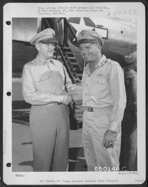 Major General Willis H. Hale Greeting Lt. General Barney M. Giles Upon His Arrival At An Airbase On Guam, Marianas Islands. (U.S. Air Force Number 65014AC)