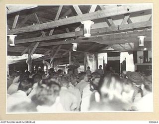 TOROKINA, BOUGAINVILLE. 1945-04-15. CHAPLAIN F.O. HULME-MOIR, HEADQUARTERS 2 CORPS, DELIVERS A SPECIAL ADDRESS DURING THE MEMORIAL SERVICE FOR FRANKLIN DELANO ROOSEVELT, LATE PRESIDENT OF THE US, ..