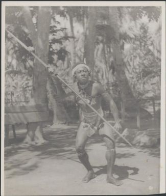 Barong, chief and Luluai of Awar village in a Snake and Spear dance pose, Awar, Sepik River, New Guinea, 1935 / Sarah Chinnery