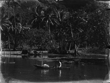 [Pacific Island woman in canoe]