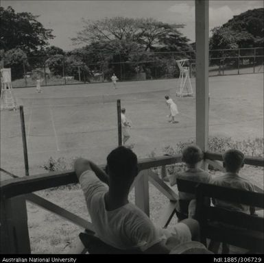 Playing tennis