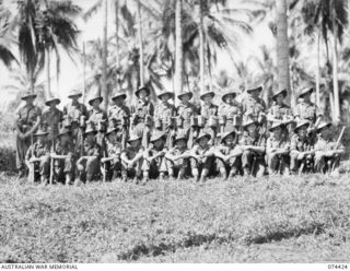 MADANG, NEW GUINEA. 1944-06-30. OFFICERS AND NON COMMISSIONED OFFICERS OF THE 24TH INFANTRY BATTALION WHO FOUGHT IN THE SALAMAUA CAMPAIGN. IDENTIFIED PERSONNEL ARE:- VX106341 SERGEANT N.J. ..