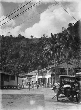 [View of a town with surrounding hills]