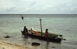 Kafaga (designated harvester) returning with produce from uta (land in outer islets)