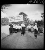 Members of the Mau, with placard in favour of self government, Apia, Western Samoa - Photograph taken by E S Andrews
