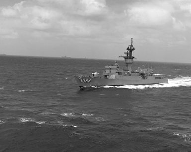 A port bow view of the frigate USS BARBEY (FF-1088) underway en route to Hawaii