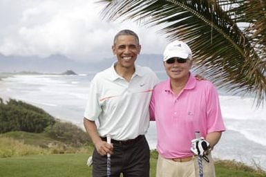 Barack Obama plays golf with Prime Minister Najib Razak, Joe Paulsen, and Mike Brush in Kaneohe Bay, Hawaii, December 24, 2014